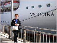 Glynis in front of P&O Cruises Ventura 