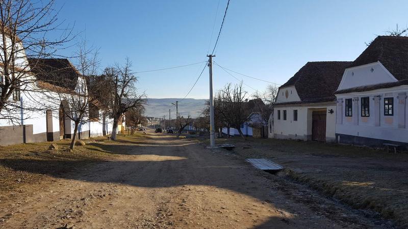 The busy main street in teh Saxon village of Viscri