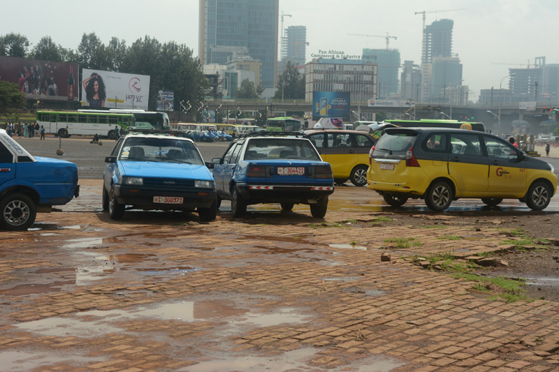 Blue Trabant and yellow taxis in Addis Ababa