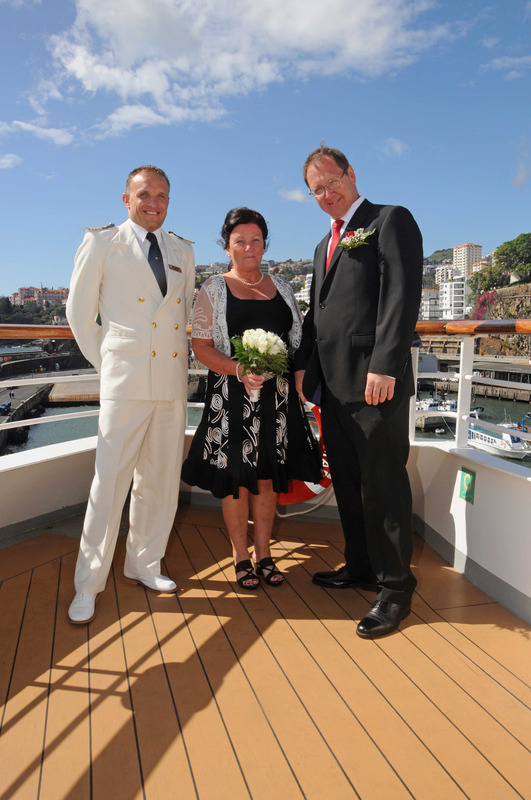 Captain Bent Ivar Gangdal and renewal of vows guests on Fred. Olsen