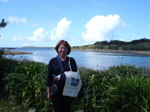 Glynis with Silver Travel bag over her broken arm at St Mary's, Isles of Scilly