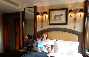 Glynis reading Silver Travel Magazine at the Tower Hotel