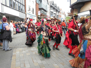Morris dancers walking through the streets of Shrewsbury
