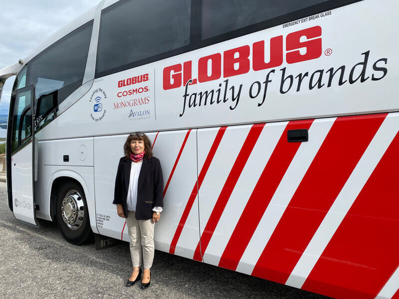 Our tour guide Margery and the Cosmos coach, which was kept immaculate throughout by our attentive driver Stuart.