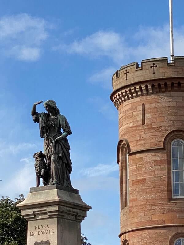 The statue of Flora McDonald, who smuggled Bonnie Prince Charlie to the Isle of Skye, looks out from Inverness Castle.