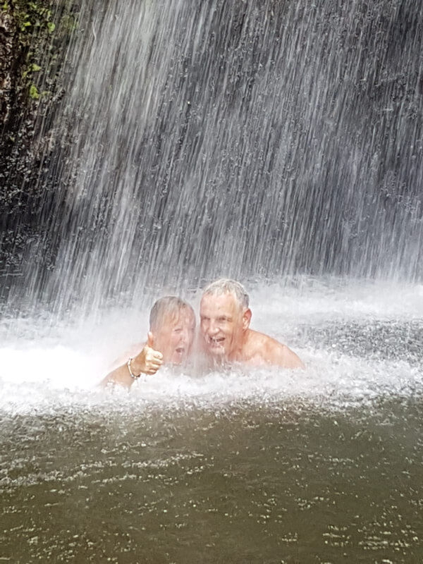 Patricia and Pascal enjoying the waterfall on St Vincent