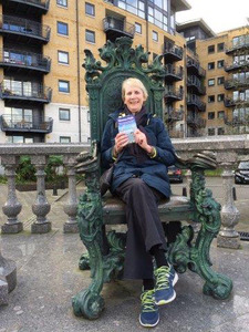 Gillian taking a rest by statue of Peter the Great