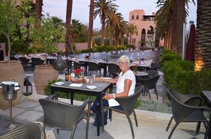 Jeannette enjoying dinner and view of the pool at The Four Seasons, Marrakesh