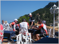 The cyclists occupied all the restaurant tables, making life difficult for ordinary holidaymakers