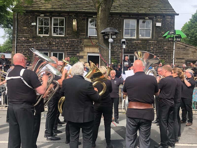 Norwegian wood ... Alexander Band from Norway play outside the Oddfellows Club in Denshaw