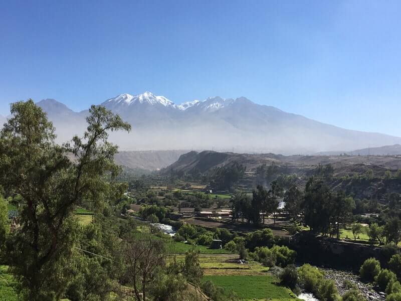 The snow-capped peak of the volcano Chachani towering above Arequipa
