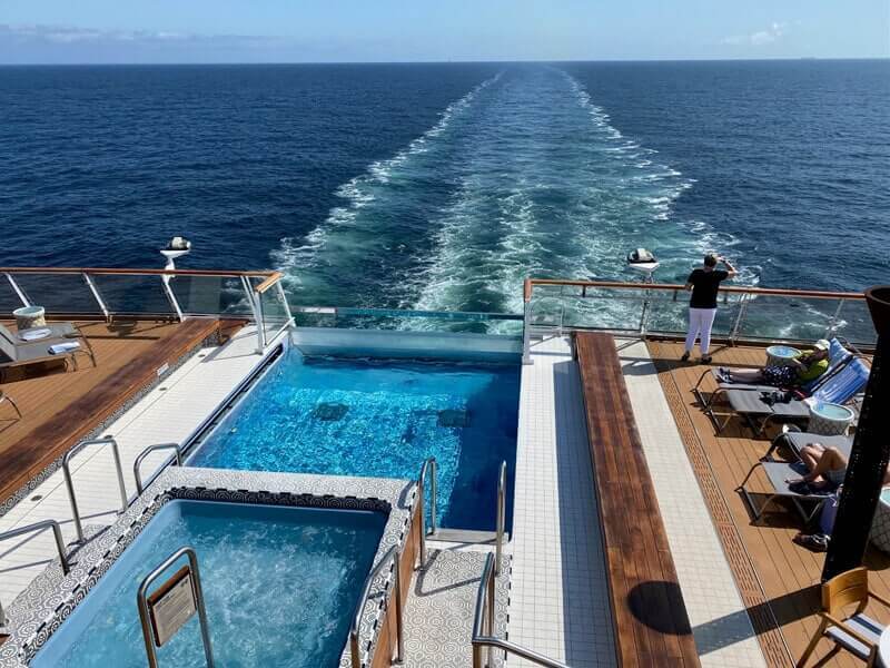 The hot tub and infinity pool overlook the ship’s wake.