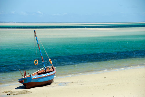 iStock-186213867---Dhow-at-the-water's-edge-on-a-beach-in-Mozambique---web