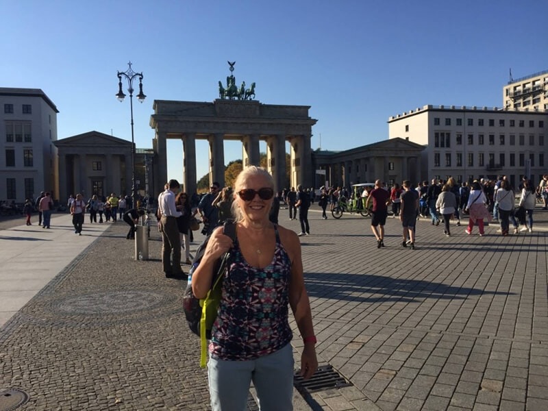Carole at the Brandenburg Gate bathed in Autumn sunshine