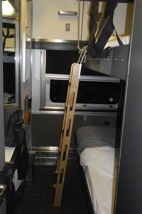The cabin from the doorway with bunk beds