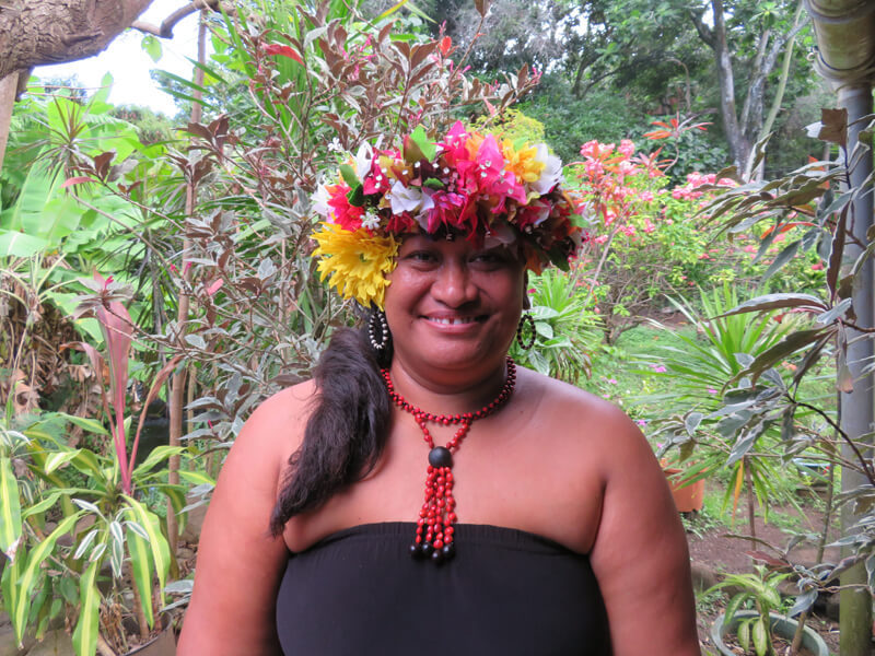Islander with traditional flowered headdress