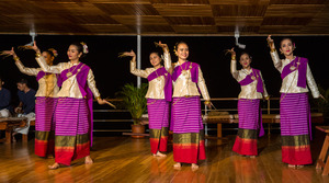 Traditional Laotian dancers perform for passengers