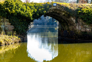 14th Century bridge of River Avon from Arthur Measures Garden, Mill Street