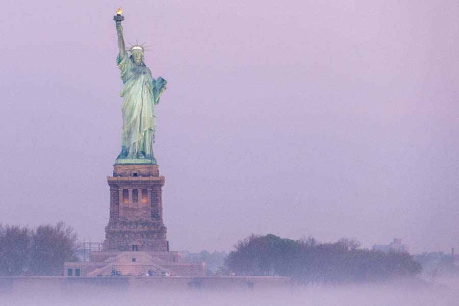 Sailing past the Statue of Liberty as we arrive in New York