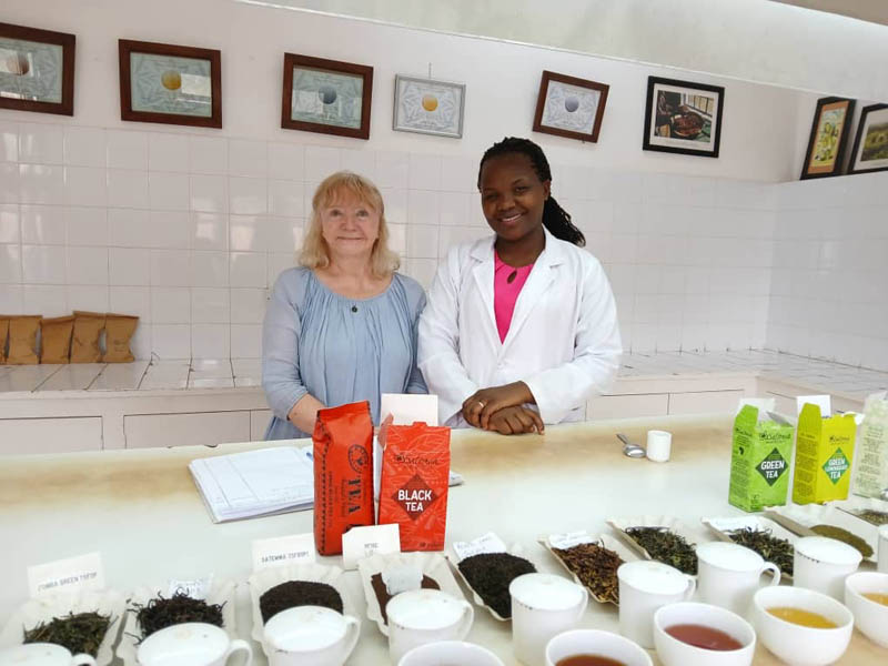 Anna testing tea with Alice
