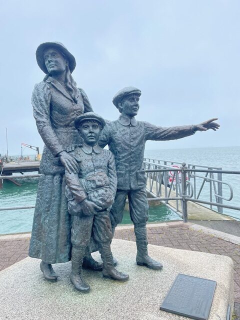 A statue of Annie Moore, the first immigrant processed at Ellis Island in 1892