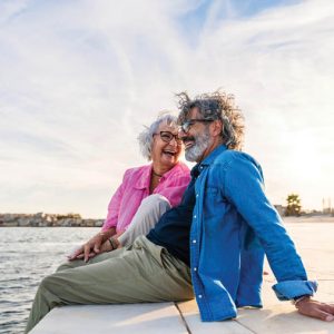Beautiful happy senior couple bonding outdoors - Cheerful old people romantic dating in the city, concepts about elderly and lifestyle